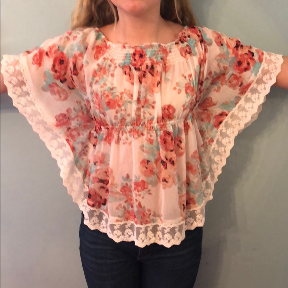 Floral blouse with lovely white trim on edge